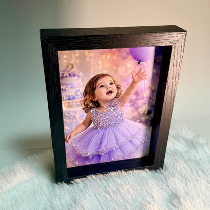 Custom glitter photo frame with personalized portrait print - standing display view, elegant black wood frame
