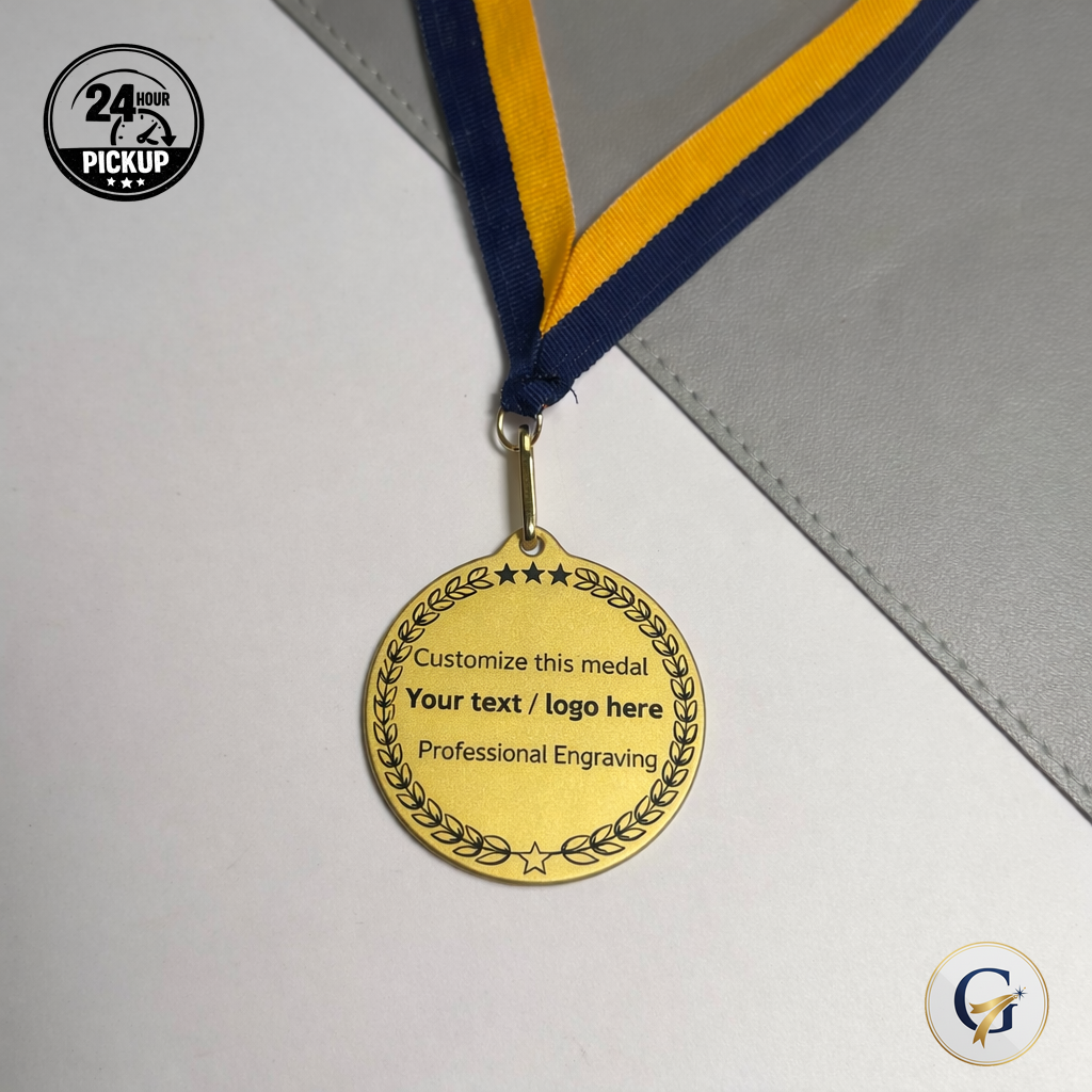 Personalized custom engraved award medals – engraving close-up. Oruz Gifts Scarborough.