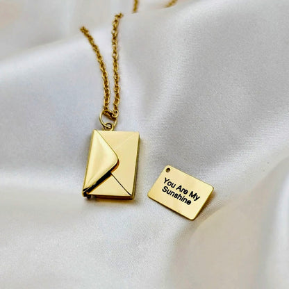 Custom engraved personalized envelope necklace – front view. Ships Canada & USA.